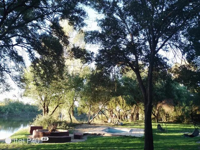 Shaded lawn and splash pool by the Vaal River | Sunrise River Lodge - Free State - Orkney - Vaal River
