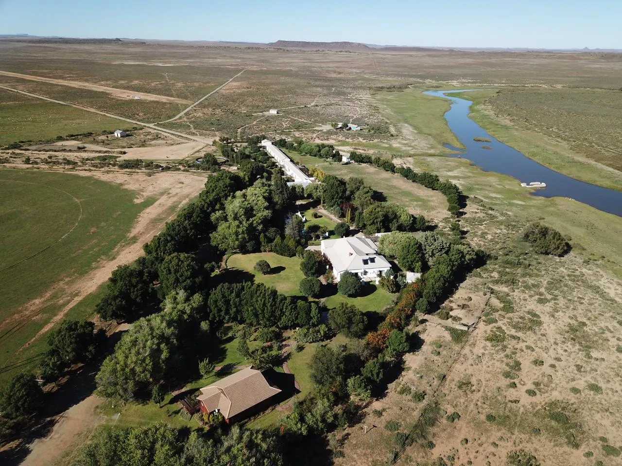 Aerial view of the lodge and river | New Holme Nature Lodge - Northern Cape - Hanover - Seekoei River