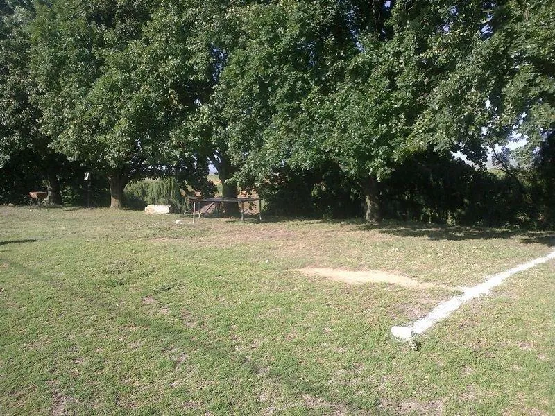 Shaded camp stand and braai | Aanleg Caravan Park - Free State - Frankfort - Wilge River