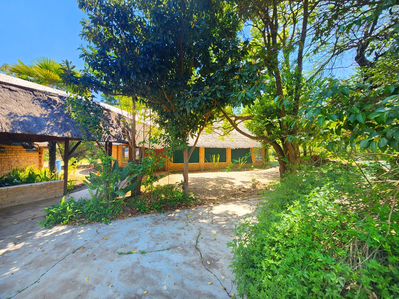 Thatched lapa and brick camp buildings at Wilge River Bush Camp | Wilge River Bush Camp - Gauteng - Bronkhorstspruit - Wilge River