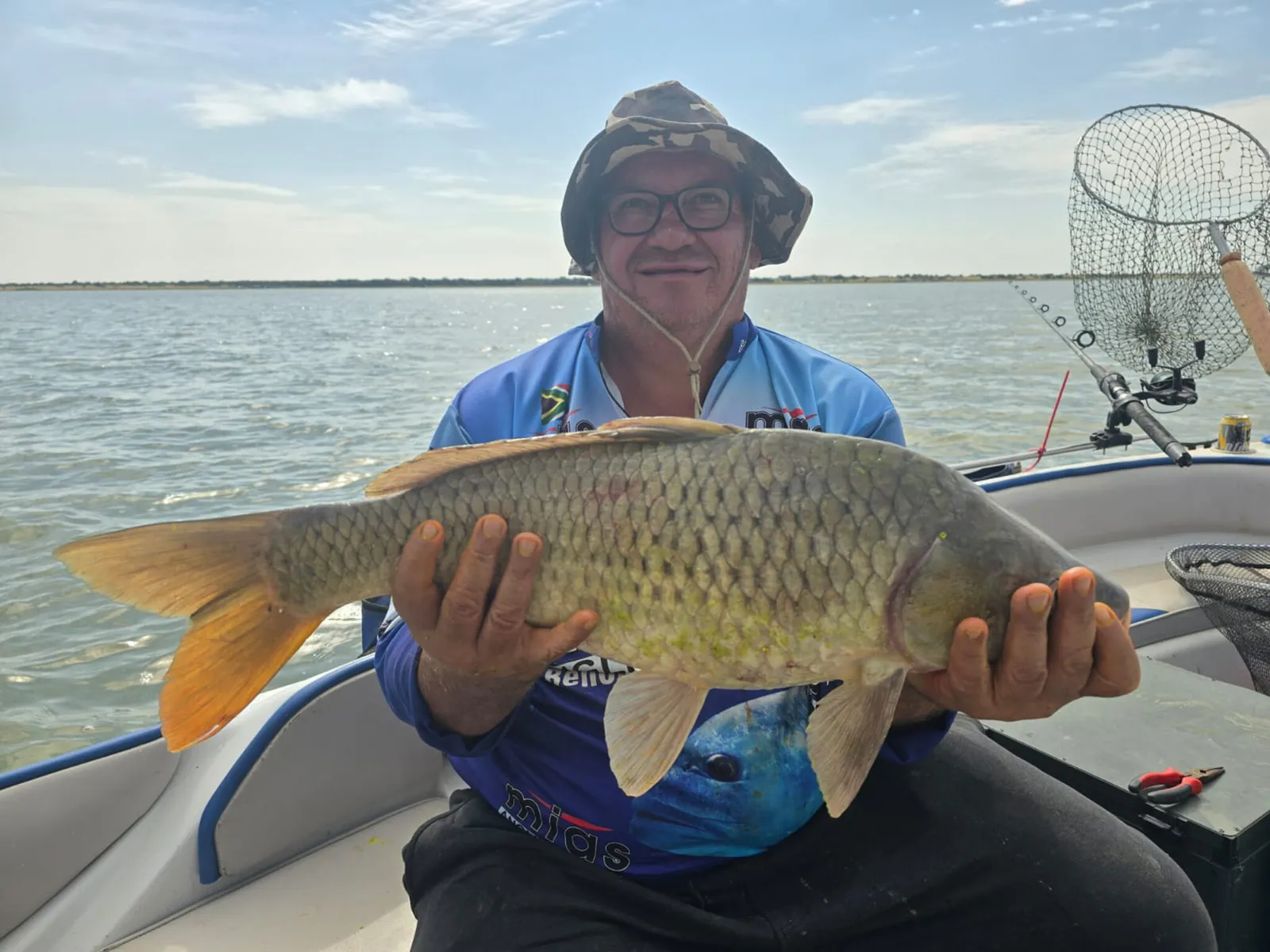 Carp catch from a boat | Bloemhof Dam Nature Reserve - North West - Bloemhof - Bloemhof Dam