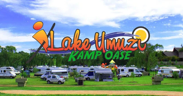 Caravan and tent campsite under willow trees | Lake Umuzi Kamp Oase - Mpumalanga - Secunda