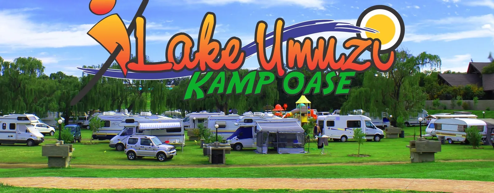 Caravan rows with playground in the campsite | Lake Umuzi Kamp Oase - Mpumalanga - Secunda