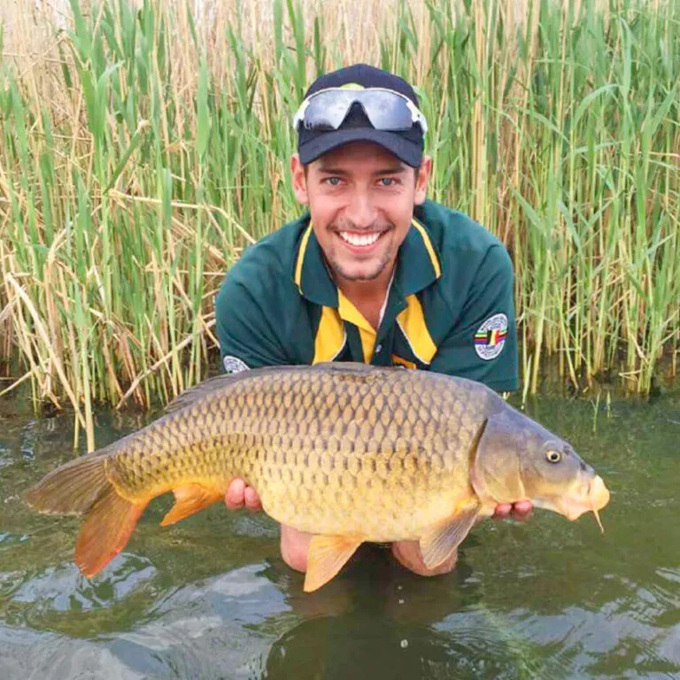 Wading angler with a carp | Klipdrift Dam Resort (Lakeview) - North West - Potchefstroom - Klipdrift Dam