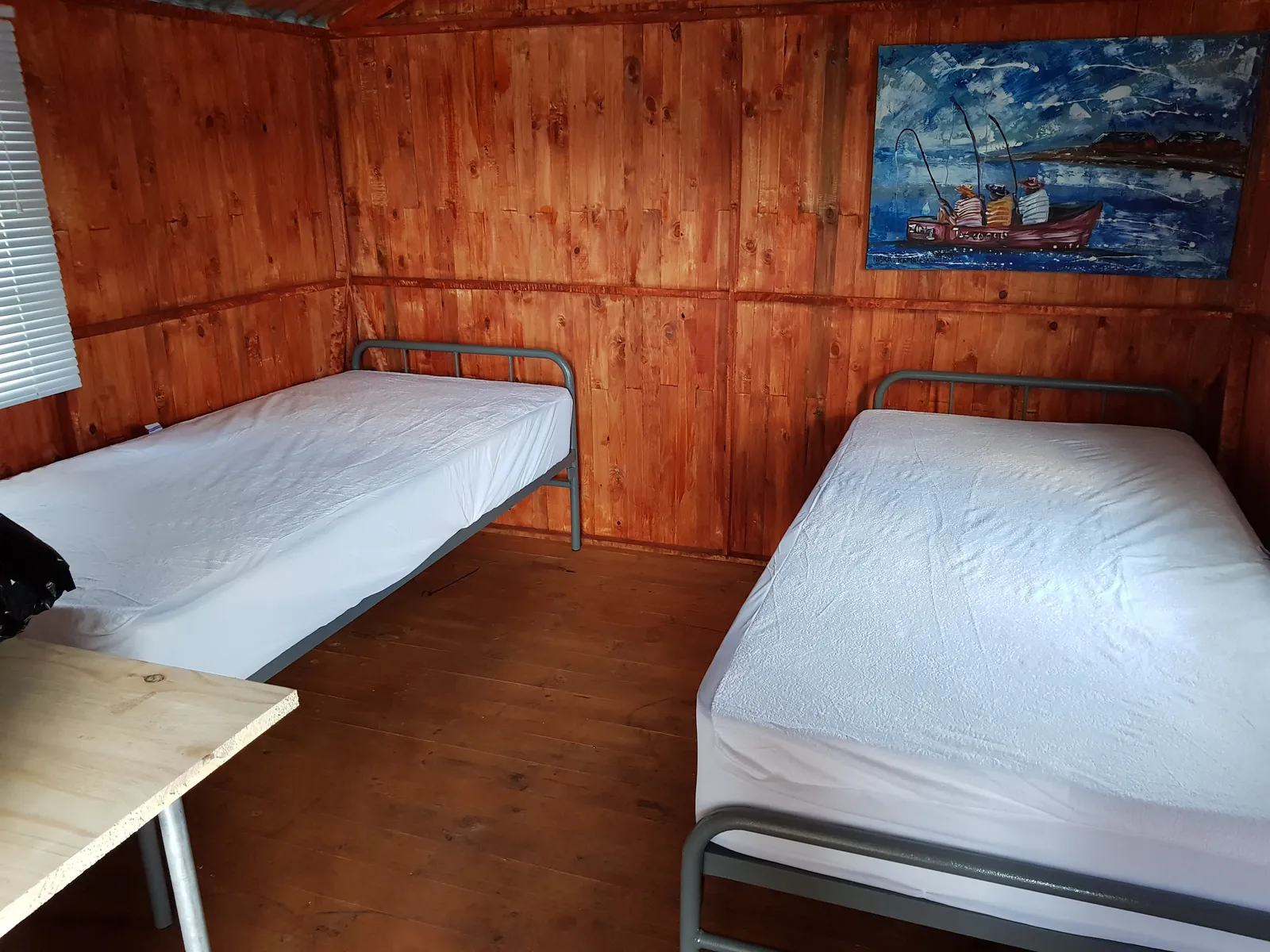 Two beds in a wooden hut | Aqua Paradiso - Gauteng - Primrose