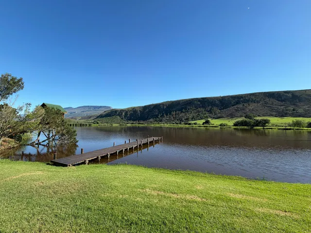 Wooden jetty on the farm dam at FleckVieh | Fleckvieh Guest Farm - Western Cape - Swellendam