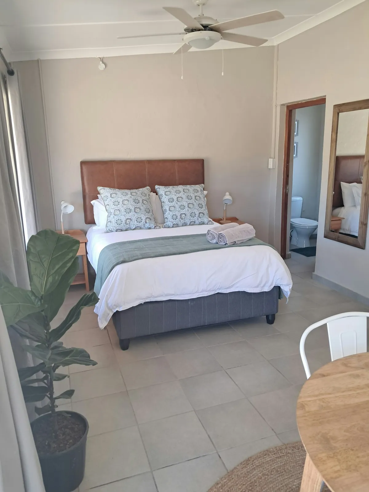 Bedroom with a double bed at Chalet 3, FleckVieh | Fleckvieh Guest Farm - Chalet 3 - Western Cape - Swellendam