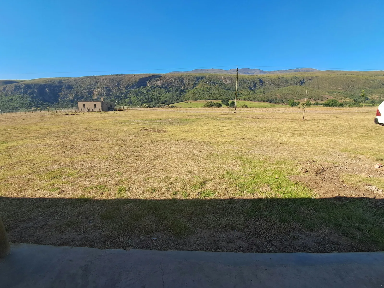 Dry field with hills at Chalet 2, FleckVieh | Fleckvieh Guest Farm - Chalet 2 - Western Cape - Swellendam