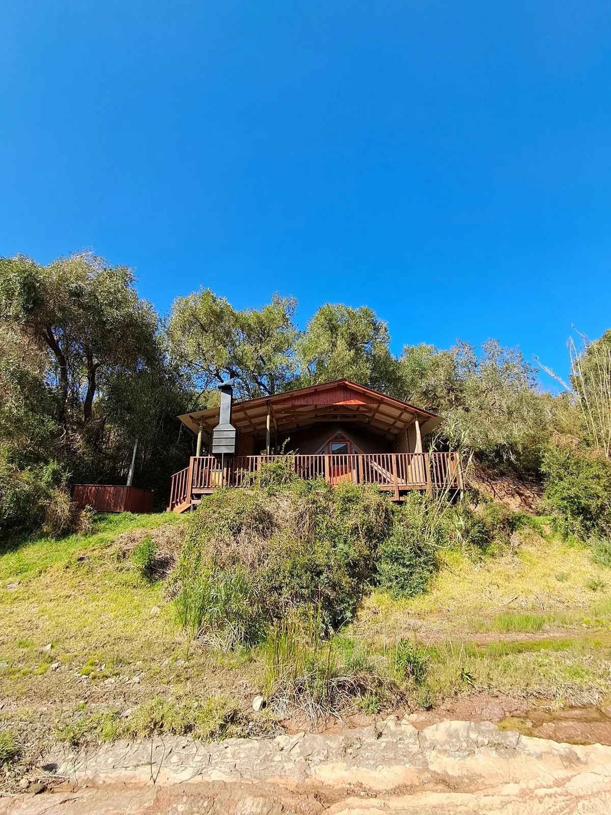 Wooden cabin on a hillside at Duiker Tent, FleckVieh | Fleckvieh Guest Farm - Duiker Tent - Western Cape - Swellendam