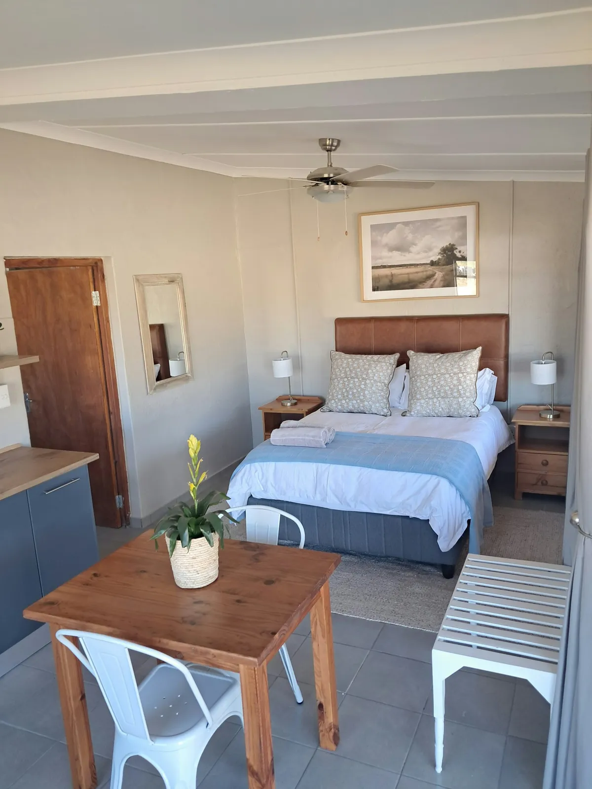 Bedroom with a double bed at Chalet 2, FleckVieh | Fleckvieh Guest Farm - Chalet 2 - Western Cape - Swellendam