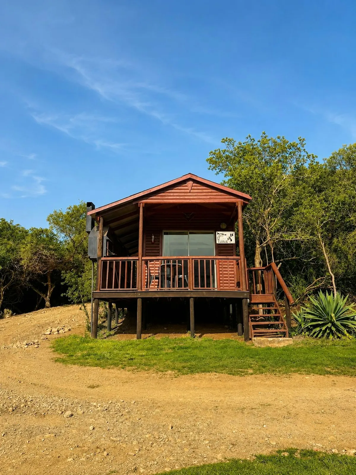 Timber cabin on stilts with a deck at Takbok, FleckVieh | Fleckvieh Guest Farm - Takbok - Western Cape - Swellendam