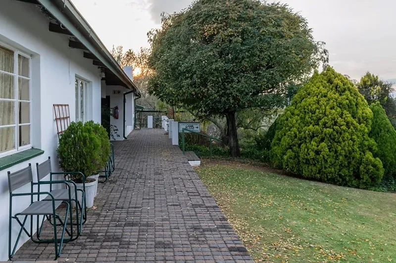 Covered veranda and garden seating | Petronella Guest House - Free State - Bethlehem - Ash River