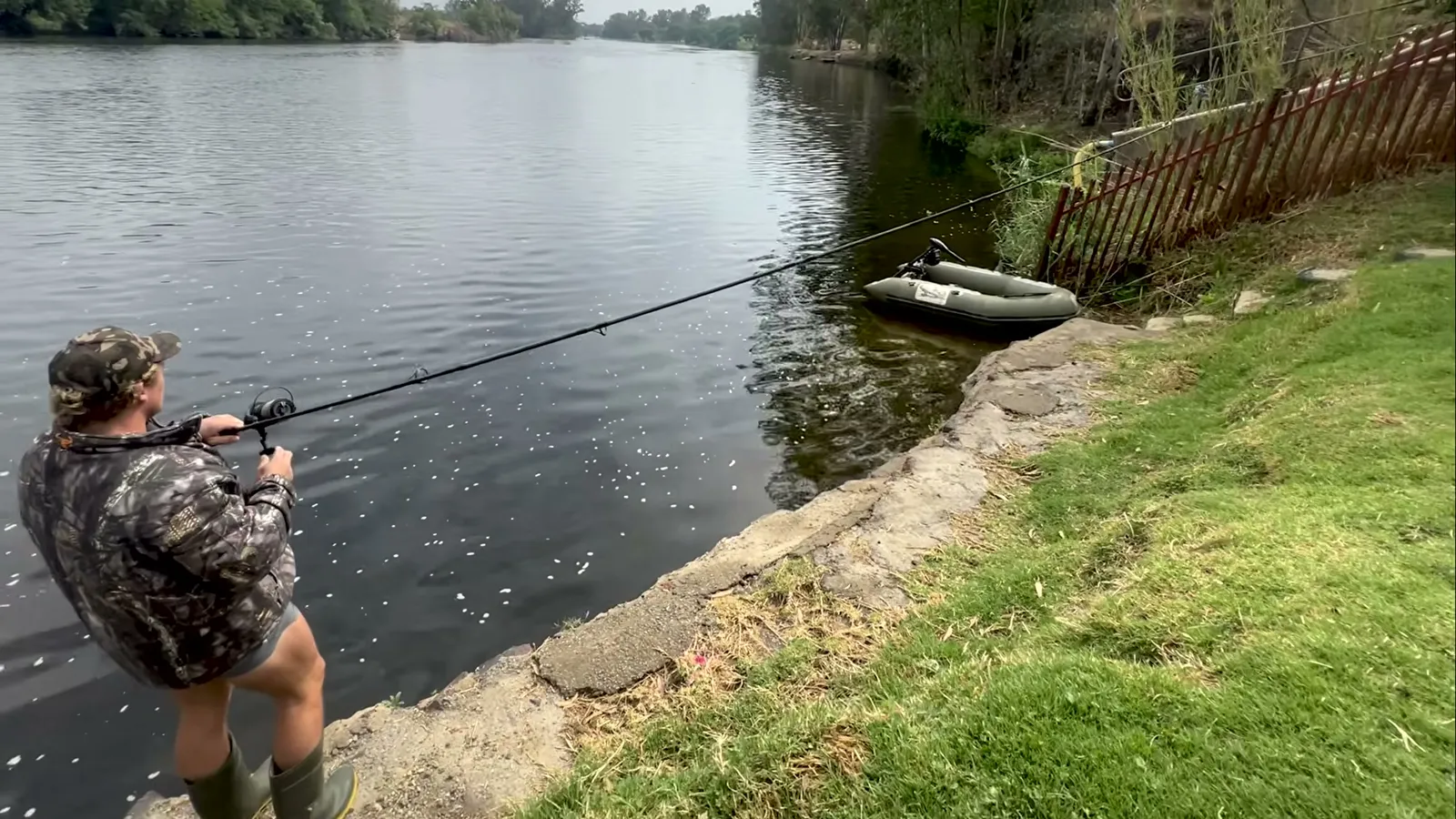 Angler fishing from the concrete bank | La Retraite - Free State - Parys - Vaal River
