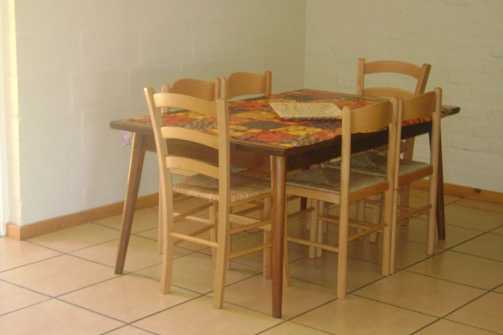 Wooden dining table with four chairs at 7-Sleeper 3-bedroom Cottage 2, Rondegat Guest Farm | Rondegat Guest Farm - 7-Sleeper 3-bedroom Cottage 2 - Western Cape - Clanwilliam - Clanwilliam Dam