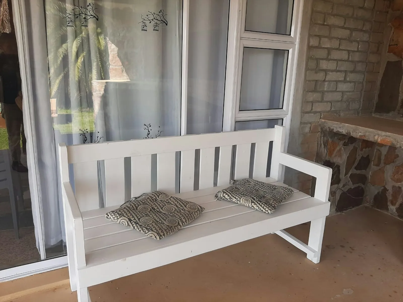 White wooden bench with two patterned cushions at Hilltop Pool Cottage, Rondegat Guest Farm | Rondegat Guest Farm - Hilltop Pool Cottage - Western Cape - Clanwilliam - Clanwilliam Dam