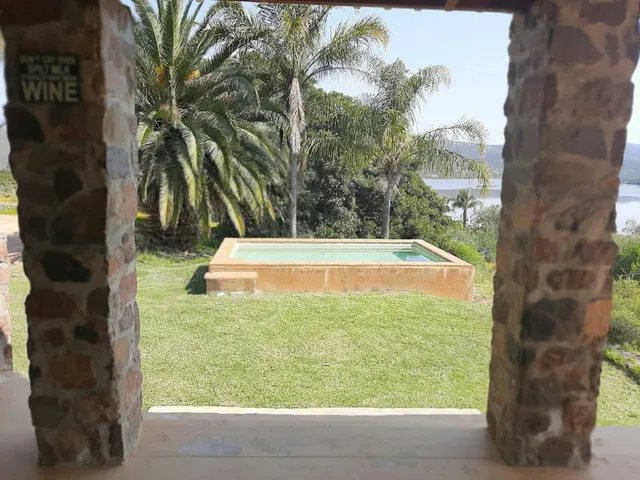 Plunge pool on the lawn between stone pillars at Hilltop Pool Cottage, Rondegat Guest Farm | Rondegat Guest Farm - Hilltop Pool Cottage - Western Cape - Clanwilliam - Clanwilliam Dam